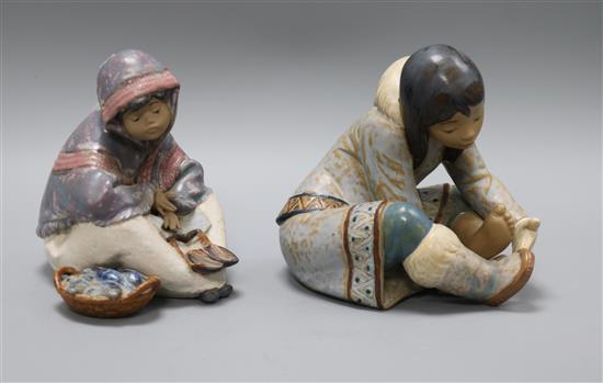 Two Lladro figures: An Eskimo Girl with Cold Feet and Eskimo Fish Seller